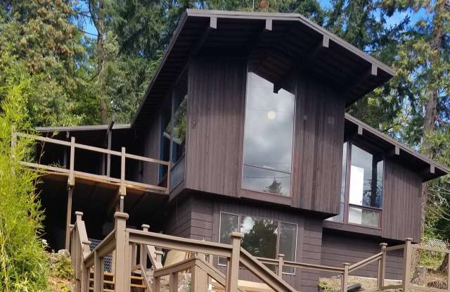 Unique Hillside Campus Home w/Floor to Ceiling Windows!!! photos photos