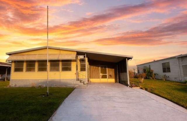 Welcome to your Florida retirement dream in desirable Hollywood Estates. photos photos