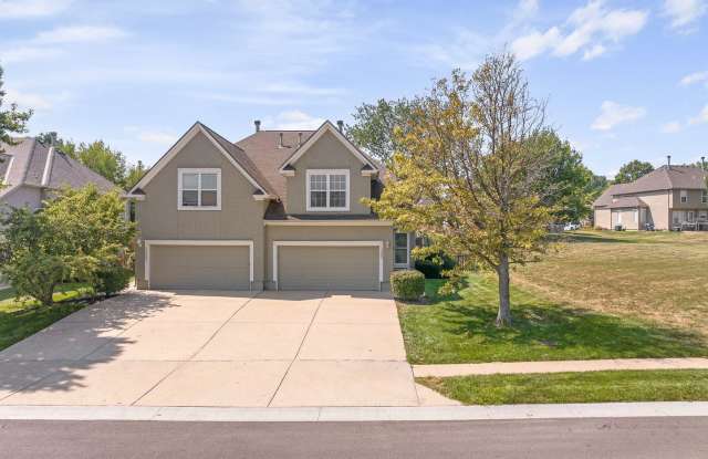 {13862} Spacious townhome in Prime Location + Maintenance Provided Community + Neighborhood Pool + Updated Kitchen + Two Car Garage photos photos