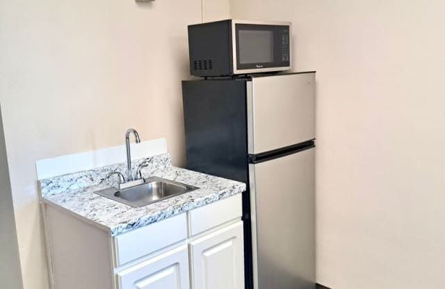 UNDER NEW MANAGEMENT: Spacious 1BR Efficiency w/ Tons of Storage! All-Inclusive "One Bill" Living, Free Wi-Fi & Laundry! Gallery 2