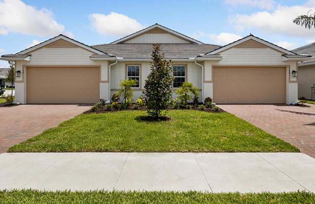 Live the Southwest Florida lifestyle in this lakefront villa in South Naples! photos photos