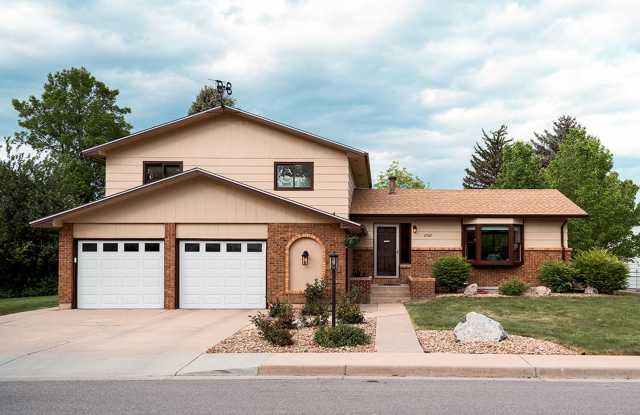 Spacious 4-Bedroom, 3-Bath Home with Finished Basement in Central Loveland $500 off September rent! photos photos