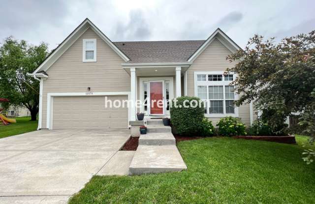 Updated Kitchen w/ Granite Counters, SS Appliances, Finished Basement and a Fenced Yard! photos photos