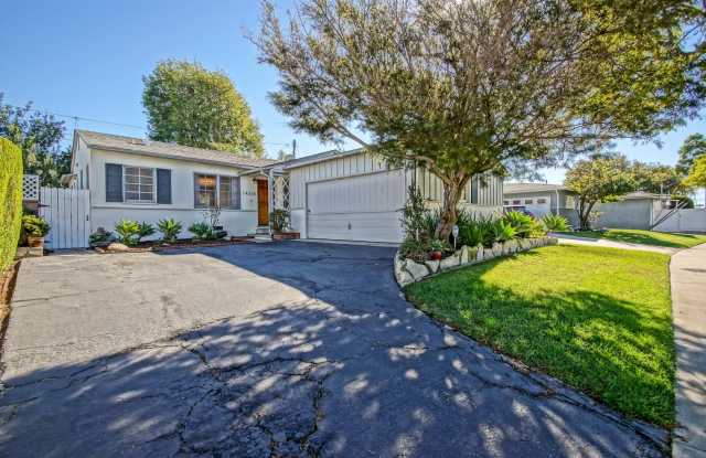 CHARMING, BRIGHT & AIRY HOLLYGLEN HOME W/ BEAUTIFULLY LANDSCAPED FRONT & REAR YARDS W/ PATIO BLOCKS TO SHOPPING, AWARD WINNING WISEBURN SCHOOLS, FREEWAY ACCESS & JUST MINS TO BEACH! photos photos