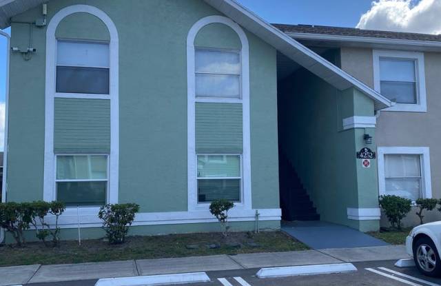 Great 2/2 condo in Pershing point Lake view  with updated Flooring photos photos