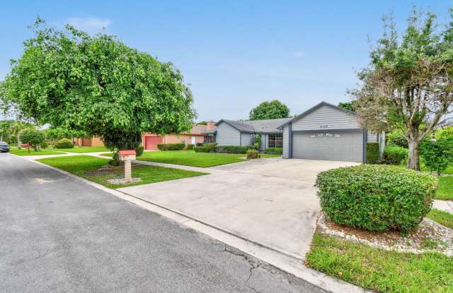 This beautifully maintained 3-bedroom, 2-bathroom home in Spencer Lakes community offers the perfect combination of comfort, convenience, and style. - 4105 Shelley Road South, West Palm Beach, FL 33407