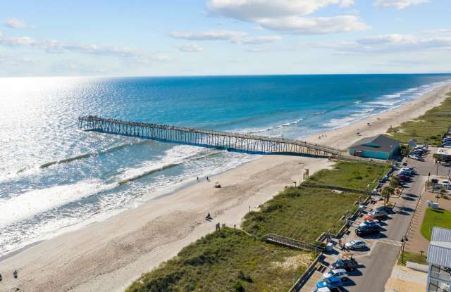 Charmed Away | Furnished 4BR/4BA Coastal Home in Kure Beach Gallery 4