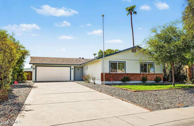 FULLY REMODELED 4 bedroom, 2 bath in Phoenix! Gallery 1