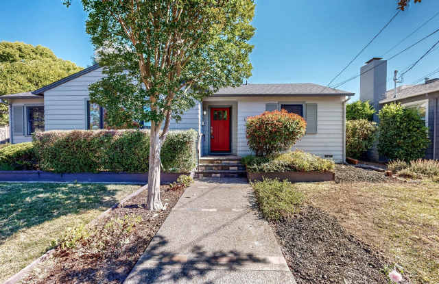 Bright & Cozy!  Conveniently located Three Bedroom Two Bath Single Level with Detached Two Car Garage! Gallery 1