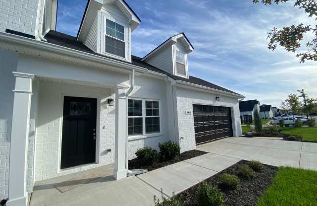 3 BD 2.5 BA Great Location Like New Build Townhome! photos photos