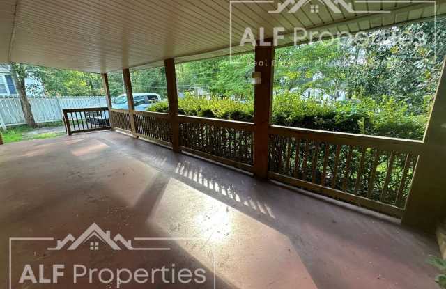 Charming 2-Bedroom Home with Bonus Sunroom, Covered Patio & Fenced Backyard Gallery 3