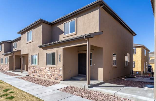 Unveiling Luxury Living: Townhomes with Main Level Office, Dual Master Suites, and Ample Storage Space! photos photos