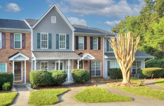 Discover this beautifully updated Raintree townhome featuring an open floor plan and a range of contemporary enhancements. Gallery 4