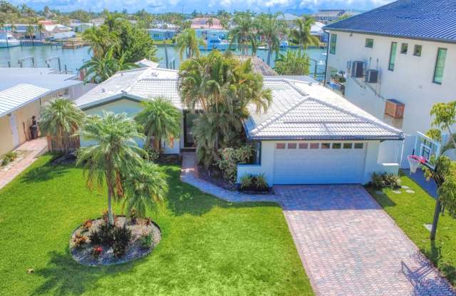 Treasure Island Three Bedroom, Two Bath Furnished Single Family Home on the water. photos photos