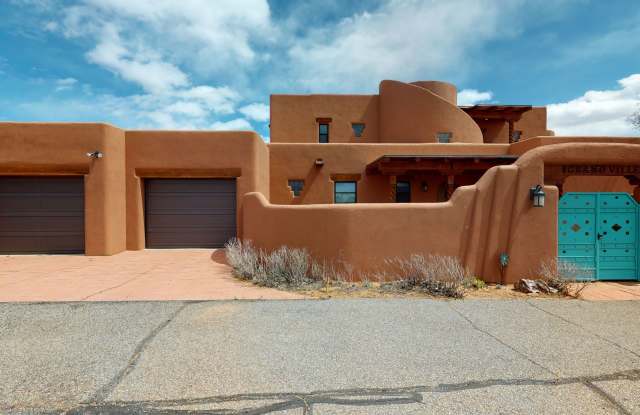 Custom Adobe style home in exclusive Navajo Ridge photos photos