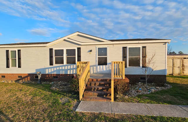 Spacious 3-bedroom, 2-bathroom mobile home. Showings Coming Soon! photos photos