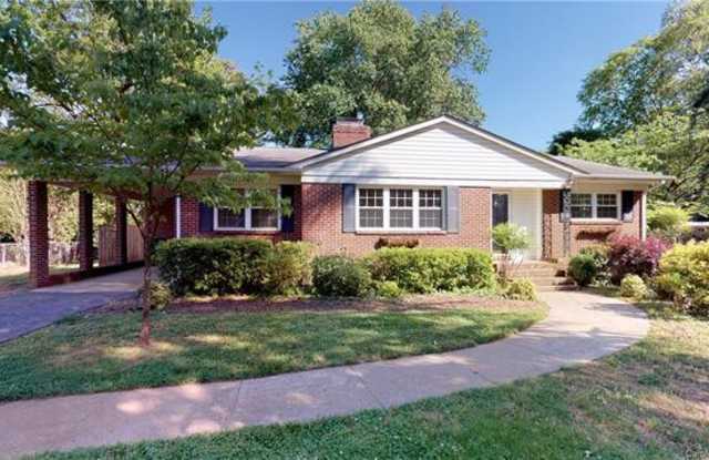 Amazing Ashbrook home that feels so private but is almost across the street from Park Road Shopping Center. - 1426 Bevis Drive, Charlotte, NC 28209