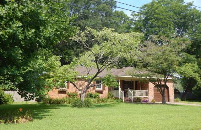 Beautiful 3 bedroom, 2 full bath home situation on a nearly half acre lot. photos photos