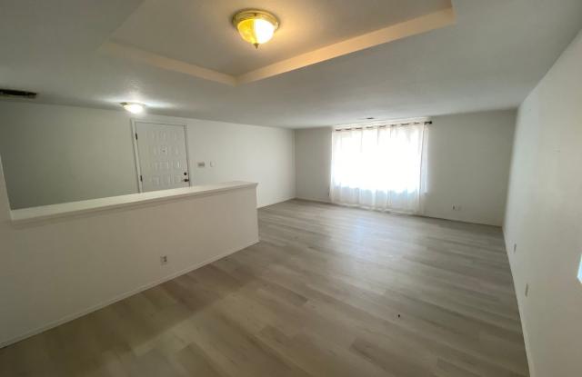 Modern Charm In Taylor Ranch: 4 Bed, 2 Bath Home with 2-Car Garage Gallery 4
