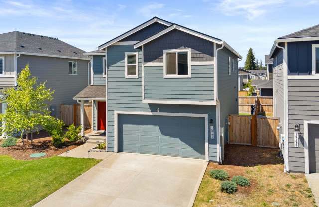 Spacious 4-Bedroom Home with Bonus Room, Main-Floor Den & Covered Patio Near JBLM photos photos