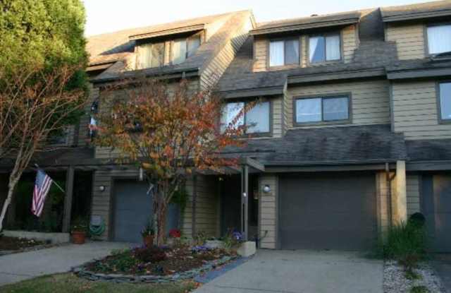 Spacious 3-bedroom, 3.5-bath home available in Aeries on the Bay offers a desirable first-floor primary bedroom just blocks from the beach! Gallery 1
