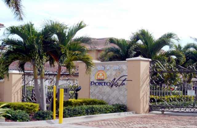 $500 OFF 1st MONTHS RENT— WATER INCLUDED Fully Furnished or Unfurnished! Lakeview Elegance in Porto Vista 2 Bed / 2 Bath Condo with Private Garage photos photos