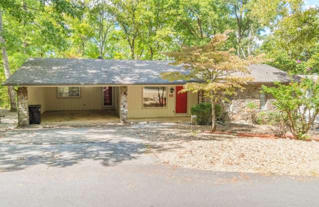 2 Bedroom, 2 Bath Home on a wooded lot in the center of the village with a carport. Dogs Case by Case. Call 501-922-9997 to set up a showing today! - 55 Sierra Drive, Hot Springs Village, AR 71909