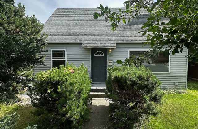 Ideally Located and Updated 4 Bed 2 Bath Fully-Fenced Home w/ Detached Garage/Shop! photos photos
