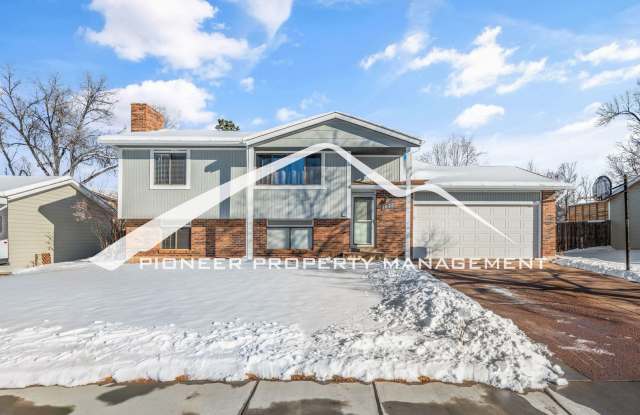 Spacious Split-Level Home in D20 with Mountain Views, 2 Car Garage, Fenced Yard and AC! photos photos