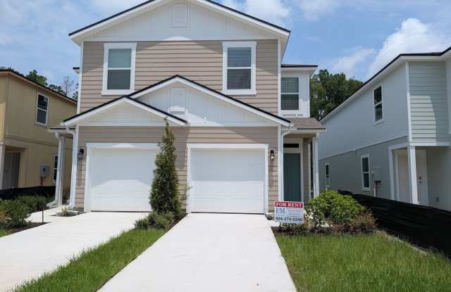 PRE-LEASING - NEW 2026 VILLA CONSTRUCTION!! 3/2.5/1 with premium finishes in the a new development community of in Hansen Creek - conveniently located just off I-295 and Lem Turner. photos photos