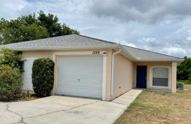 2 Bedroom, 2 Bath Duplex with 1 Car Garage in Deltona - Priced to Rent! photos photos
