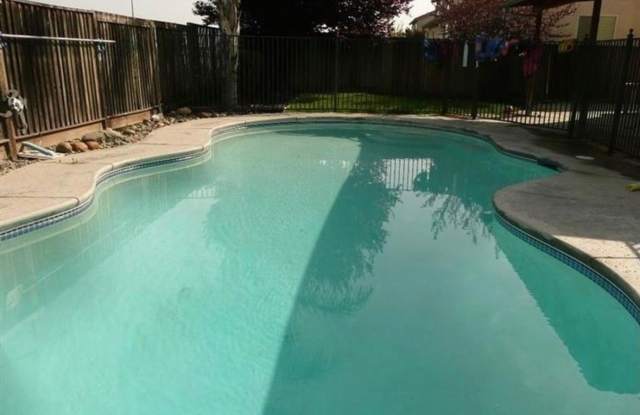 Upscale Home with Pool in Desirable Area Gallery 1