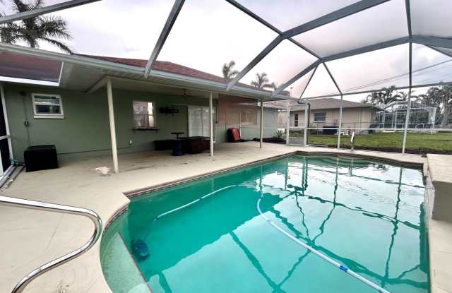 You will LOVE the beauty of this newly remodeled 3/2/2 pool home! - 210 Southeast 1st Place, Cape Coral, FL 33990 You will LOVE the beauty of this newly remodeled 3/2/2 pool home! - 210 Southeast 1st Place, Cape Coral, FL 33990