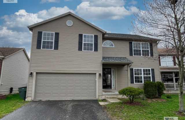 Spacious 4-Bedroom Home with Fenced Backyard, Deck, and 2-Car Garage photos photos