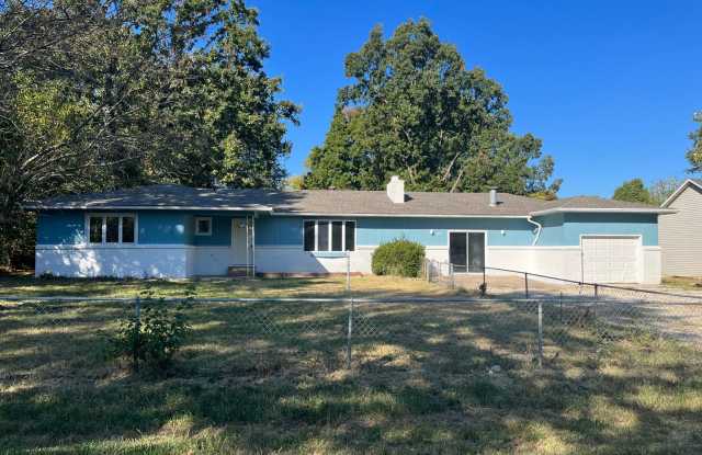 Flexible 4-Bedroom Home with Fenced Backyard photos photos