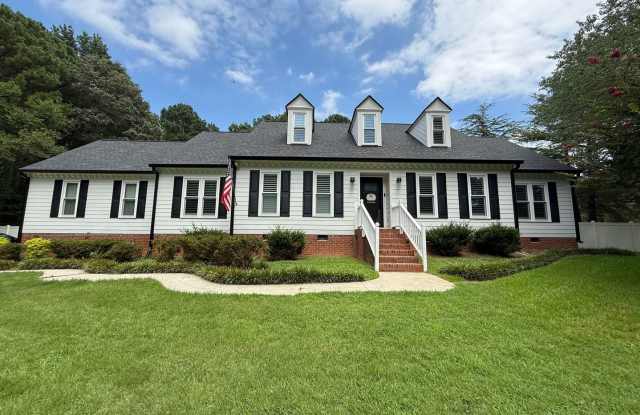 **OFFERING WAIVED APPLICATION FEES** Stunning *4BD, 3BA North Raleigh Home on an Acre Lot with a 2-Car Attached Garage Near Falls Lake photos photos