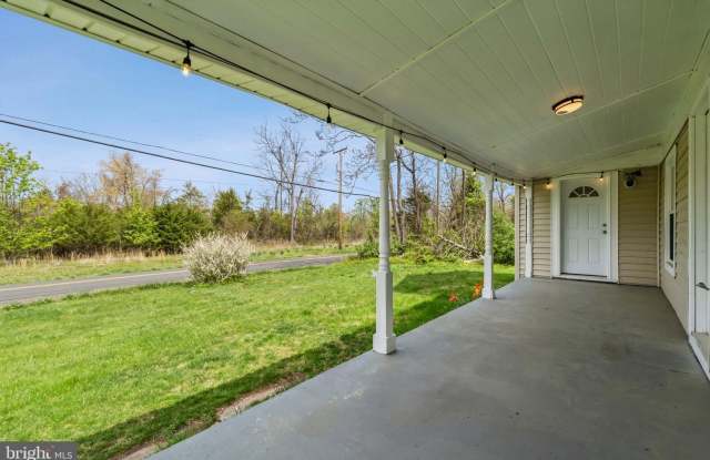 Experience the perfect blend of peaceful country charm and modern comfort in this beautifully refreshed residence, ideally situated between Gainesville and Warrenton. Gallery 3