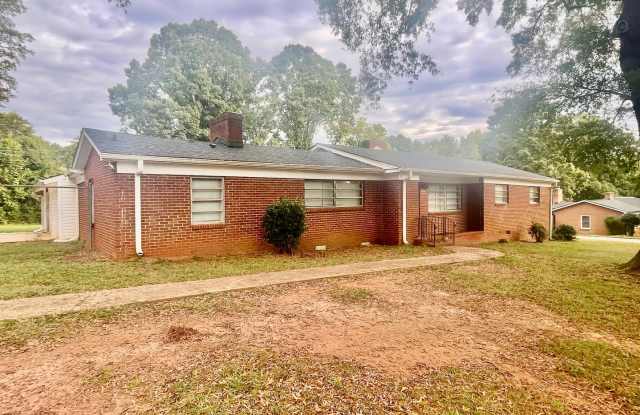 This Beautiful 4 bed 2.5 bath brick ranch home sits on 0.68 acres of land in the desired Steelberry community Gallery 4
