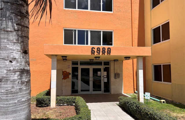 6980 NW 186th St - 6980 Northwest 186th Street, Country Club, FL 33015