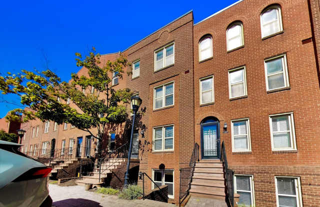 Spacious 709 Sq Ft 1BR with Fireplace & In-Unit W/D at The Car Barn – $2,250 + Electric Gallery 1