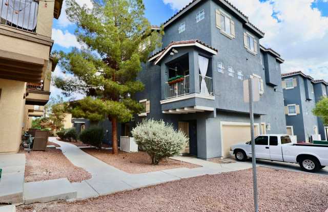 Spacious 3-story townhome located in a desirable gated community! Gallery 1