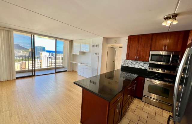 RENOVATED 2 Bedroom, 1 Bathroom, 2 Parking unit with Utilities Included in The Chateau Waikiki with Ocean View! Gallery 1