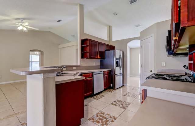 Welcome to this spacious 4-bedroom, 2-bathroom home in Jacksonville! photos photos