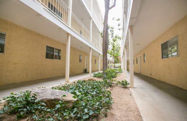1st Month Rent Free! Absolutely darling, fully remodeled, single story, updated condo in a NE Heights gated community! Gallery 3