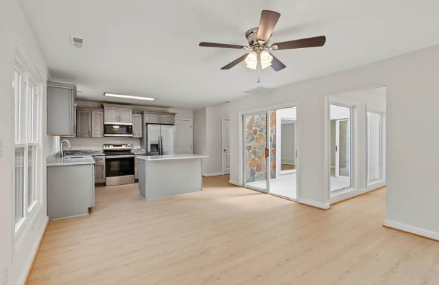 Renovated Seaford Home with Skylit Atrium & Spacious Yard Gallery 3