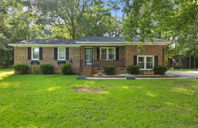 Charming Brick Ranch with Updated Kitchen & Private Backyard! Gallery 1
