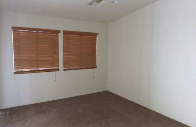 Huge family room with kitchen nicely tucked in the middle. photos photos