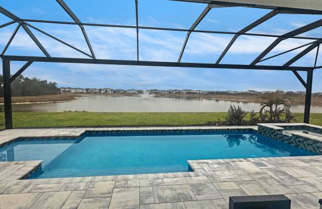 Brand New spacious 4bd/3.5bth Sarasota Home with Swimming Pool, 3-Car Garage and Loft Gallery 1