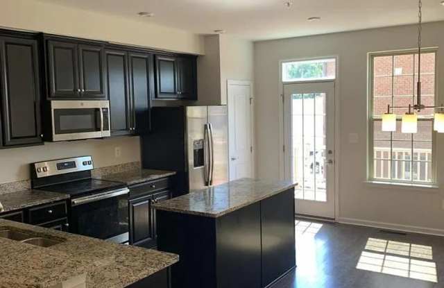 Modern 2BR + Office Townhome with Garage & Deck Near Hopkins Bayview Gallery 3
