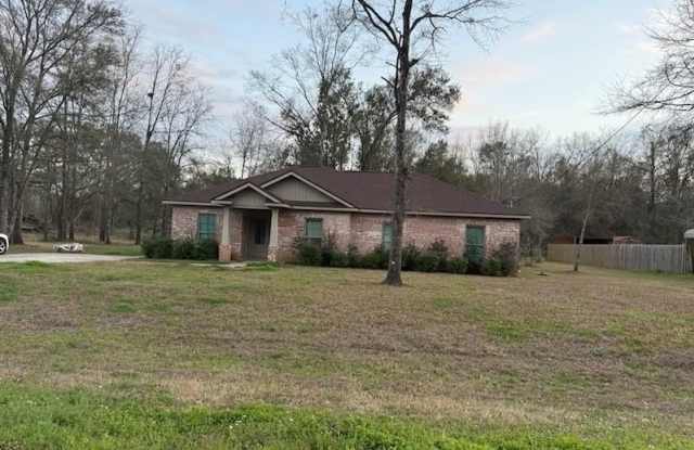 1439 Creola Axis Loop Road N photos photos